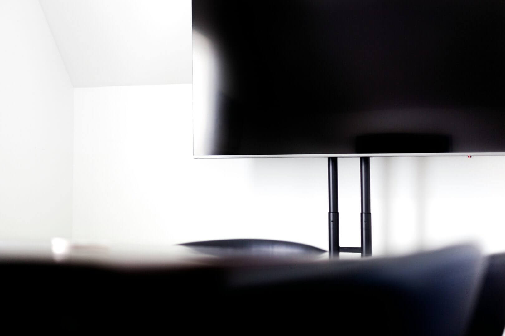 A TV overlooking a conference room